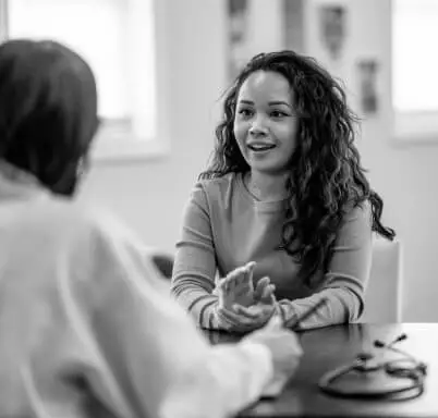 A patient talks to a doctor.